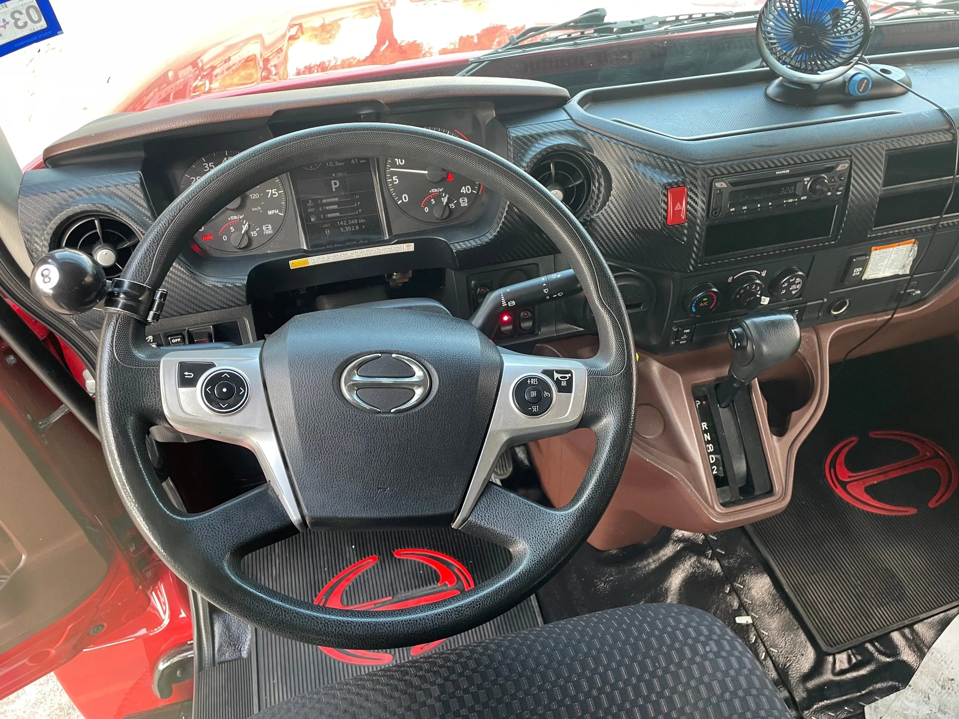 2023 Red extended cab HINO w/ Century 12 series LCG Sales Units