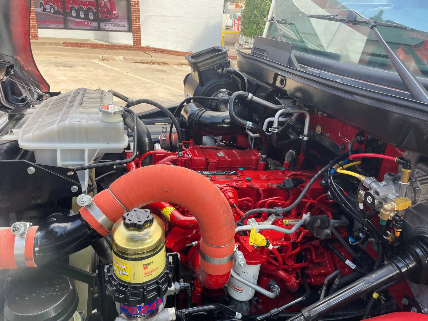 2023 Red extended cab HINO w/ Century 12 series LCG Sales Units