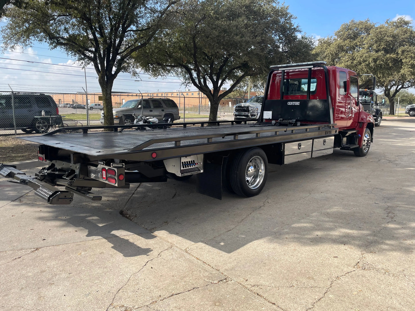 2023 Red extended cab HINO w/ Century 12 series LCG Sales Units