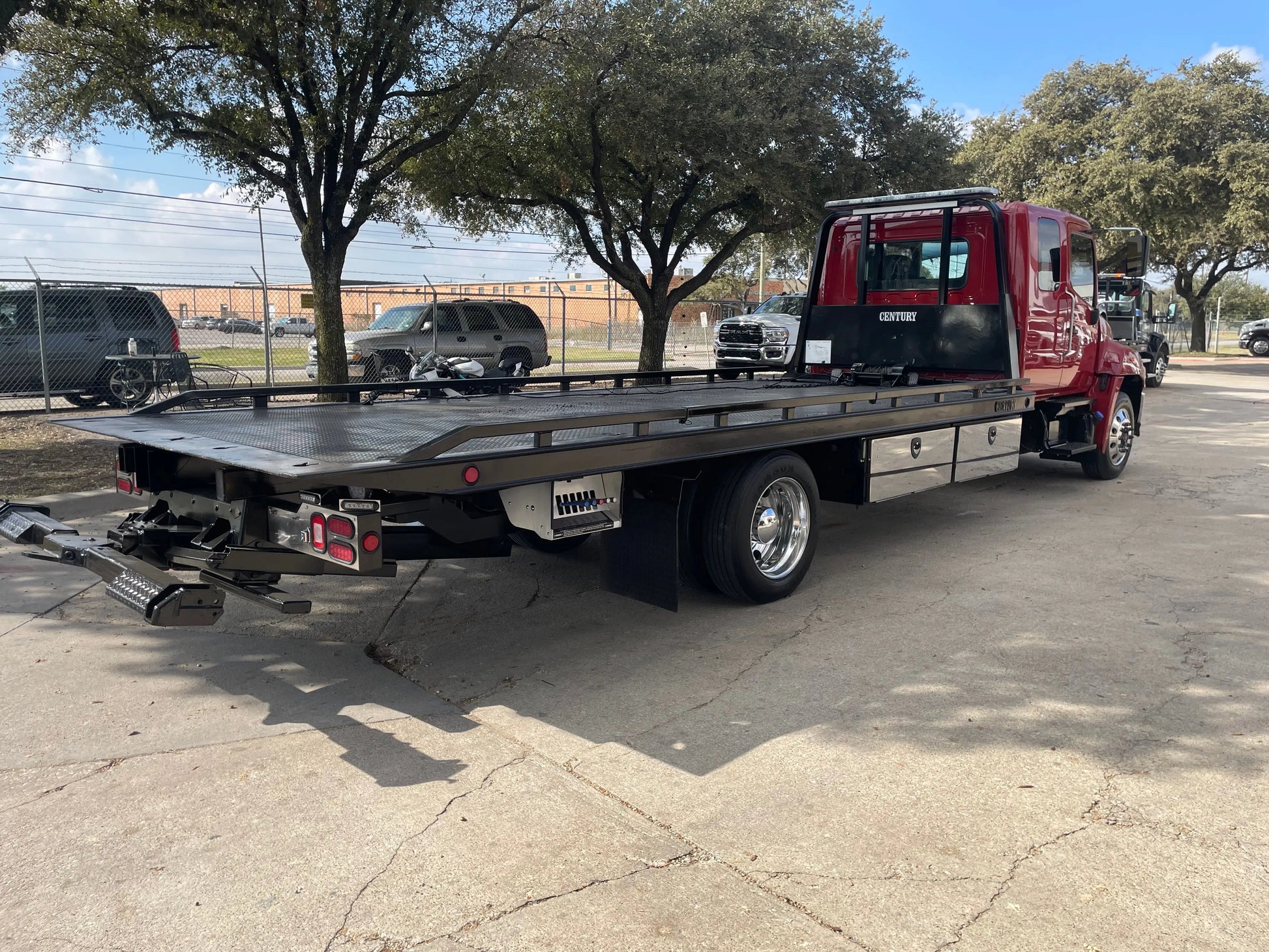 2023 Red extended cab HINO w/ Century 12 series LCG Sales Units