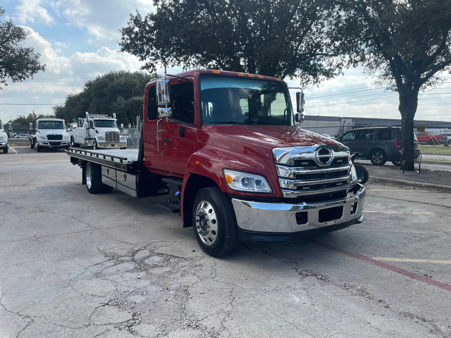2023 Red extended cab HINO w/ Century 12 series LCG Sales Units
